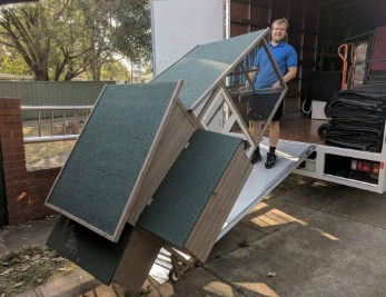 expert Melbourne removalists & storage - loading boxes onto truck